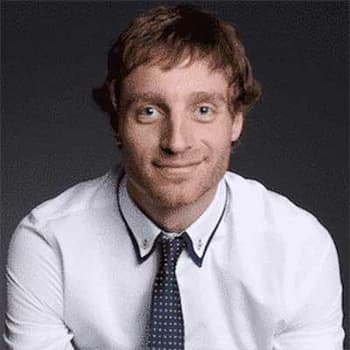 a man wearing a white shirt and a blue tie.