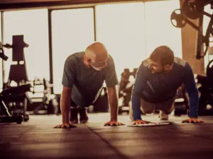 old man young man exercising